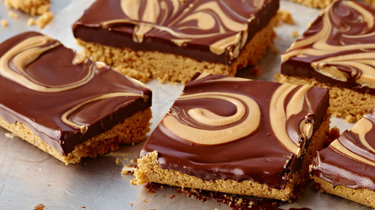 tray of no bake chocolate peanut butter bar squares